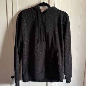 Nike Black and Gold Hoodie with Swoosh Patterned Design